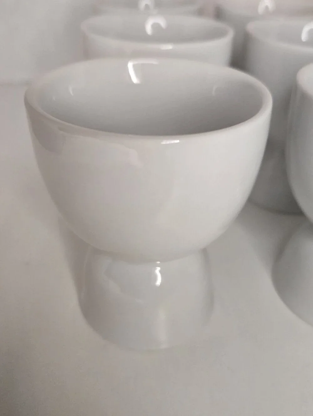 Set of 12 White Porcelain Double Egg Cups